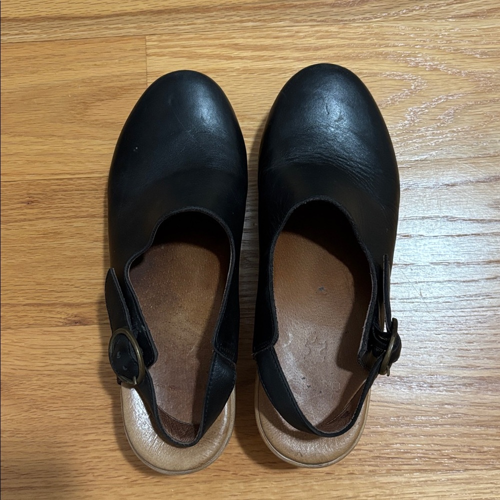 Danilo black sling back clogs.